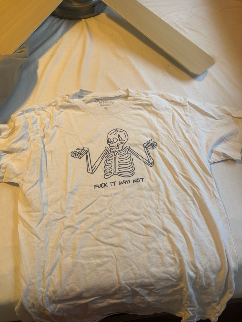Spencer's White T-Shirt with Black Skeleton Graphic